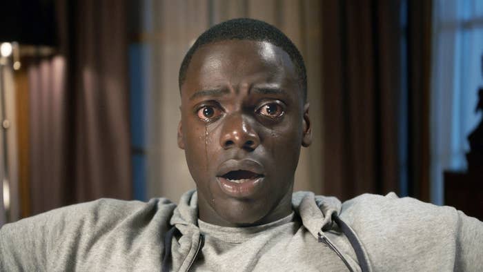 Daniel Kaluuya as Chris in Get Out, sitting in a chair frozen, tears streaming from his eyes