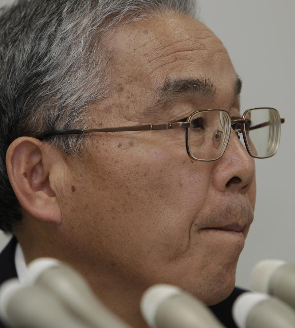 Japanese computer chipmaker Elpida Memory Inc. President Yukio Sakamoto reacts during a press conference in Tokyo Monday, Feb. 27, 2012. Elpida filed for bankruptcy Monday after amassing debts from nose-diving prices, longtime competition from Samsung and the flooding in Thailand last year that stagnated demand. (AP Photo/Shizuo Kambayashi)