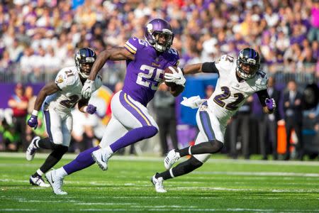 Oct 22, 2017; Minneapolis, MN, USA; Minnesota Vikings running back Latavius Murray (25) runs for a touchdown in the third quarter against the Baltimore Ravens at U.S. Bank Stadium. Mandatory Credit: Brad Rempel-USA TODAY Sports