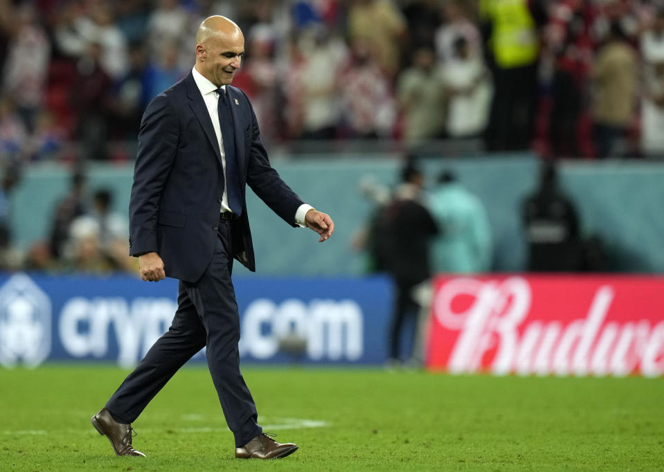 Belgium's head coach Roberto Martinez leaves the field after the World Cup group F soccer match between Croatia and Belgium at the Ahmad Bin Ali Stadium in Al Rayyan, Qatar, Thursday, Dec. 1, 2022. (AP Photo/Francisco Seco)