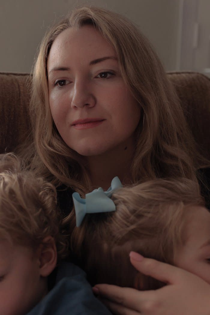 Cox poses for a portrait with her two children.<span class="copyright">Shelby Tauber for TIME</span>