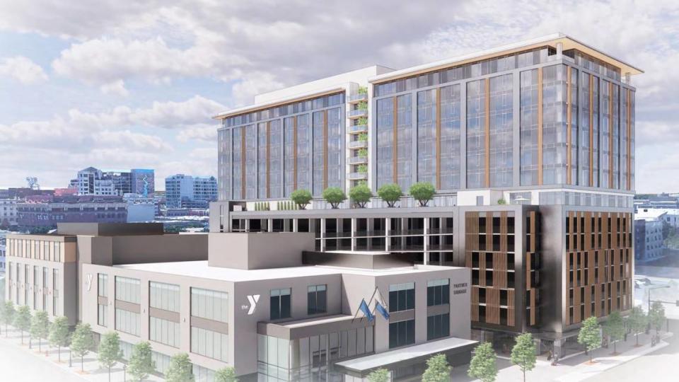 This rendering shows the proposed new downtown Boise YMCA, at left, and a 15-story building that would be built next door. GBD Architects / Pivot North Architecture