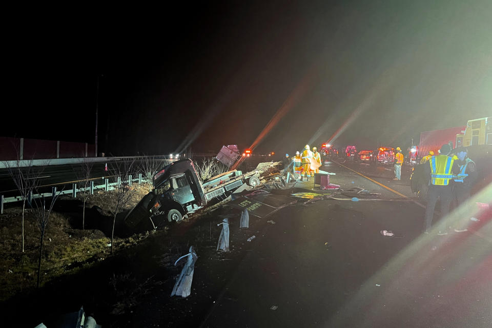 Emergency personnel at the scene of a crash on Interstate 64 in York County, Va. (Virginia State Police via AP)