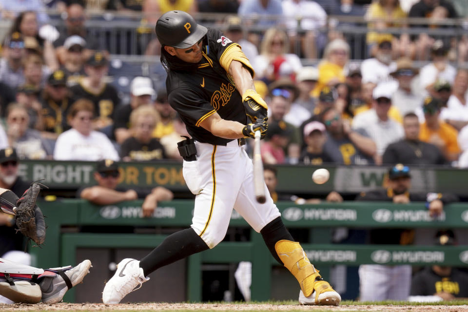 Pittsburgh Pirates' Connor Joe hits an RBI triple during the fifth inning of a baseball game against the Minnesota, Twins, Sunday, June 9, 2024, in Pittsburgh. (AP Photo/Matt Freed)