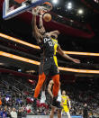 Detroit Pistons center James Wiseman (13) fouls Indiana Pacers forward Aaron Nesmith during the first half of an NBA basketball game, Wednesday, March 20, 2024, in Detroit. (AP Photo/Carlos Osorio)