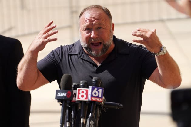 Alex Jones Speaks To The Media Outside The Sandy Hook Trial In Waterbury, Connecticut - Credit: Getty Images