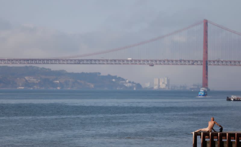 Man takes swim during COVID-19 pandemic in Lisbon