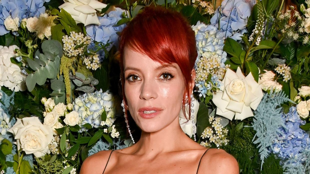 Lily Allen red hair and black dress