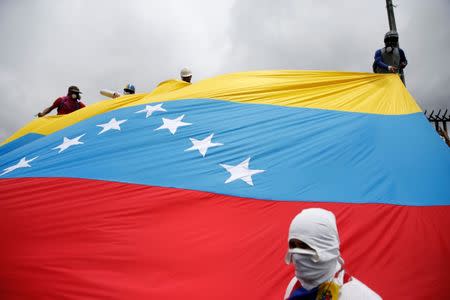 Demonstrators gather in front of an Air Force base while rallying against Venezuelan President Nicolas Maduro's government in Caracas, Venezuela, June 24, 2017. REUTERS/Ivan Alvarado