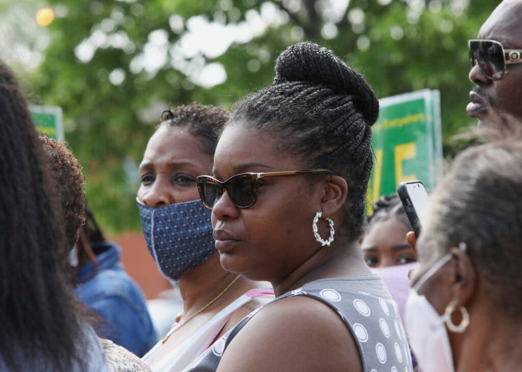 Mia Wright, center right, is seen after speaking with reporters on June 4, 2020, in Chicago. (AP Photo/Teresa Crawford, File)