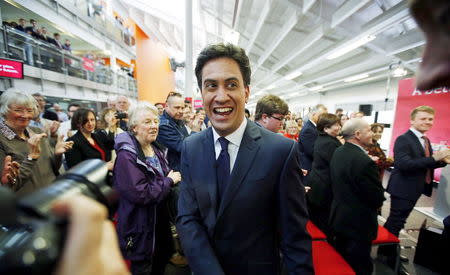 Britain's opposition Labour Party leader Ed Miliband walks through a crowd gathered for at a campaign event in Warwick, central England April 8, 2015. REUTERS/Peter Nicholls