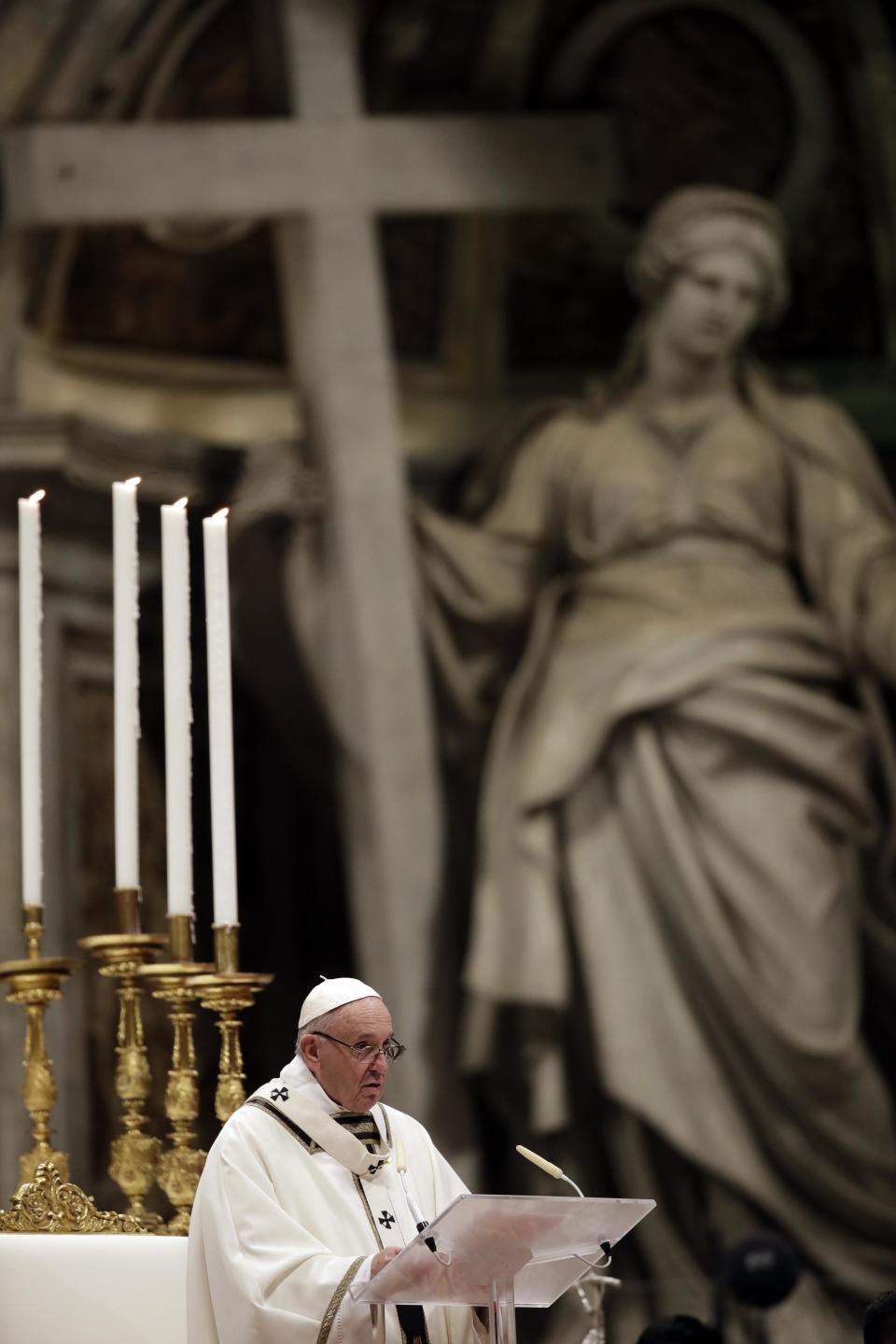 Pope Francis delivers his message as he celebrates the Christmas Eve Mass in St. Peter's Basilica at the Vatican, Monday, Dec. 24, 2018. (AP Photo/Alessandra Tarantino)