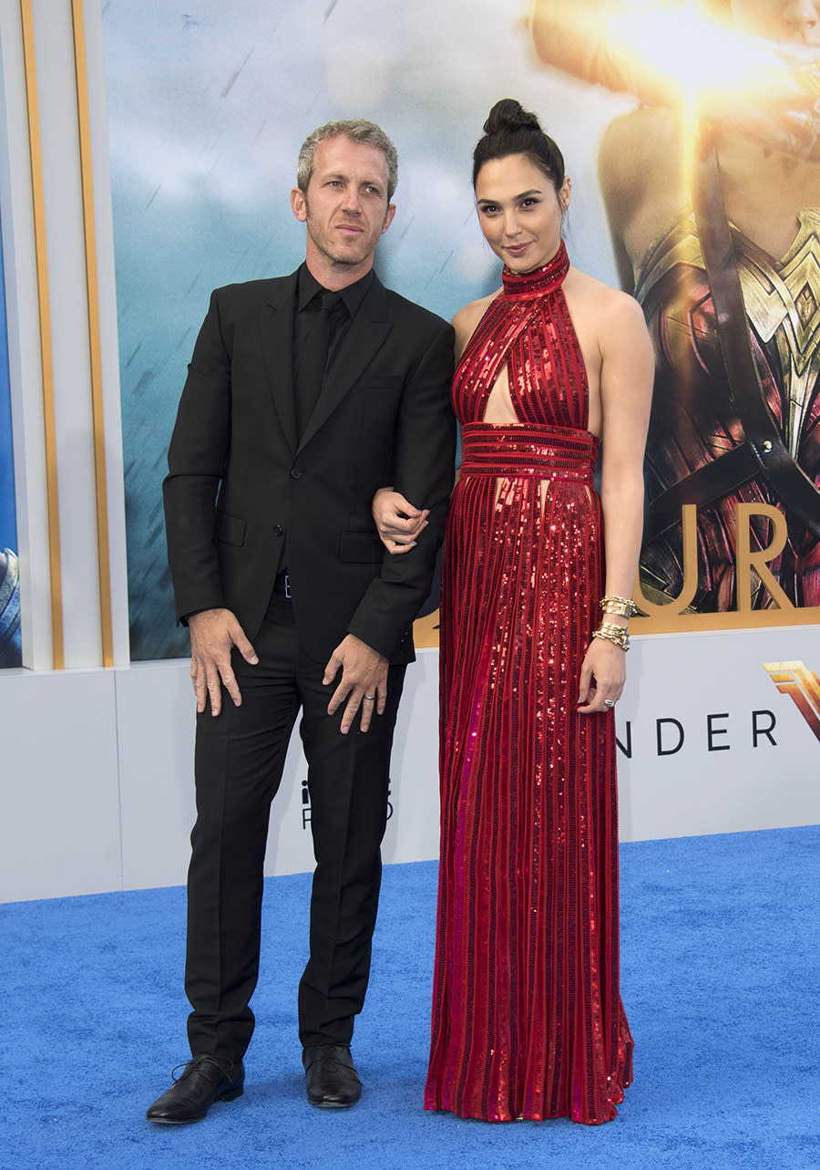 <p>Gal Gadot with husband Yaron Versano. The couple’s second daughter was born in March. (Photo: Valerie Macon/AFP/Getty Images) </p>