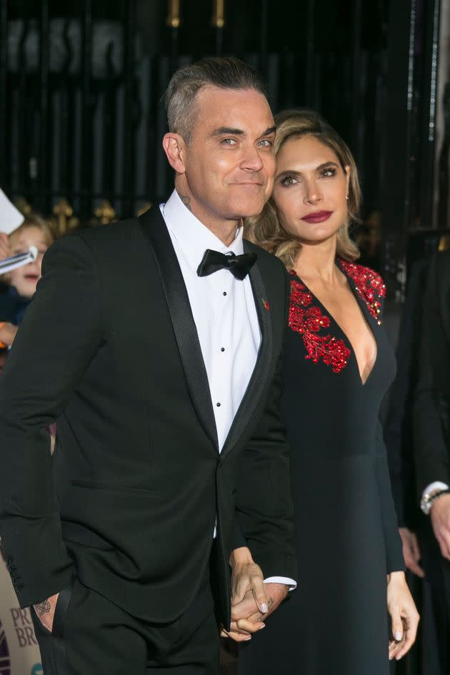 Robbie and his wife Ayda Field in 2018 (Photo: via Associated Press)