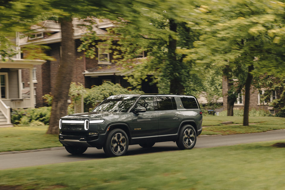 This photo provided by Rivian shows the R1S electric SUV. The R1S can tow up to 7,700 pounds when properly equipped. (Courtesy of Rivian Automotive via AP)
