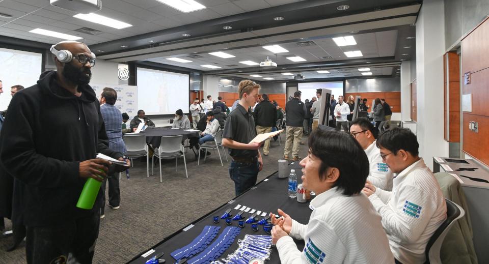 People attend the Ultium Cells job fair, Wednesday, Jan. 31, 2024, at Lansing Community College's West campus in Delta Township.