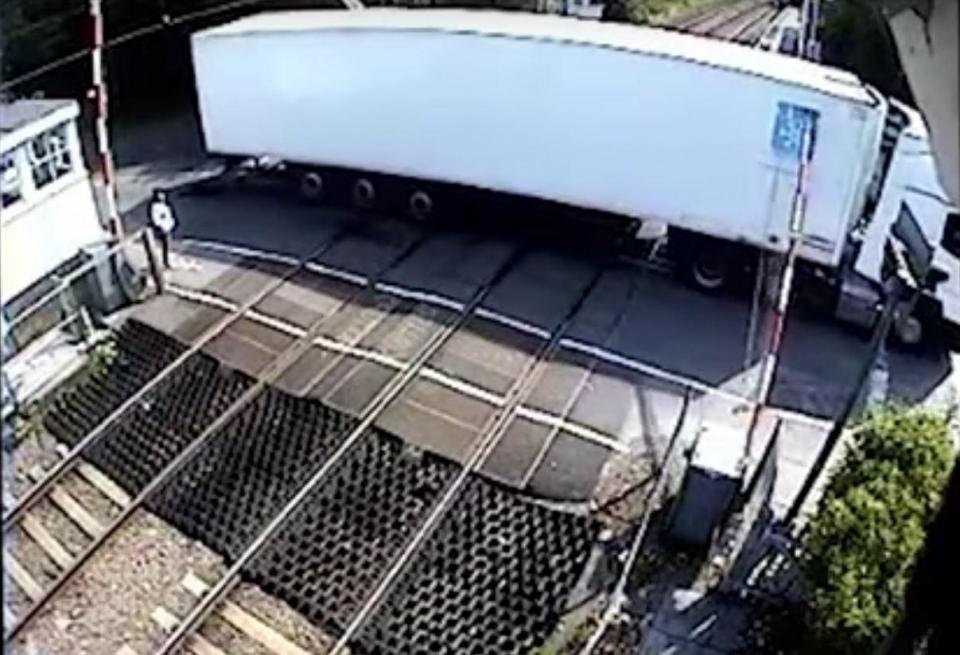 The lorry became stuck on the tracks at a level crossing in Essex (British Transport Police)