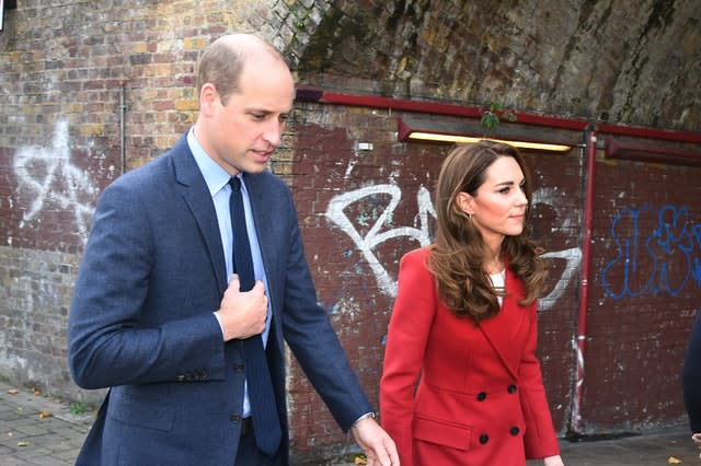 The Duke and Duchess of Cambridge during a visit to view some of the images from the Hold Still photography project at Waterloo Station in London. Evening Standard/Jeremy Selwyn