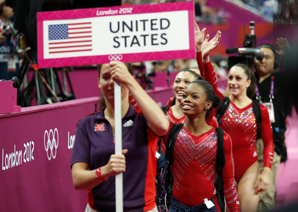 <p>A then 16-year-old Gabby Douglas led the ‘Fierce Five’ U.S. women’s gymnastics team through the team final at the London Olympics on July 31, 2012. (Matt Dunham/AP) </p>