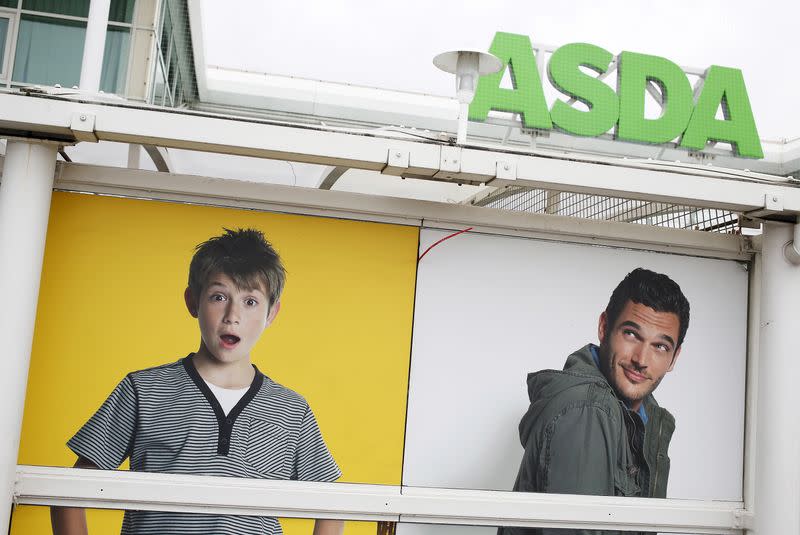 An advertisement for George by Asda clothing is seen outside an Asda store in northwest London