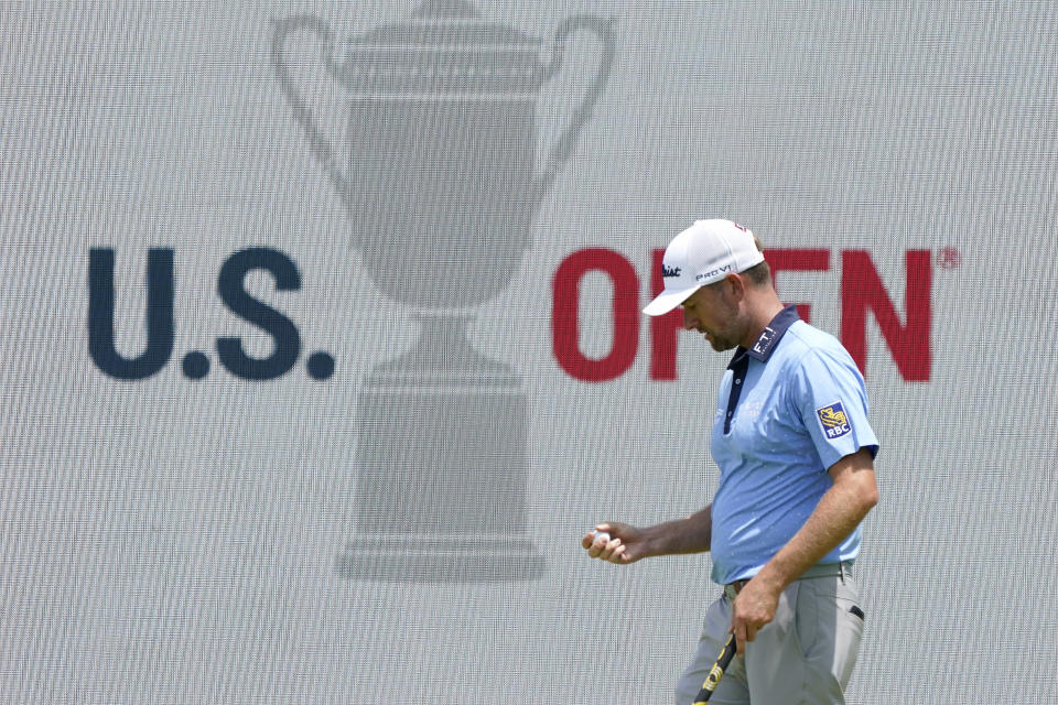 Webb Simpson walks on the 17th green during a practice round of the U.S. Open Golf Championship, Wednesday, June 16, 2021, at Torrey Pines Golf Course in San Diego. (AP Photo/Marcio Jose Sanchez)