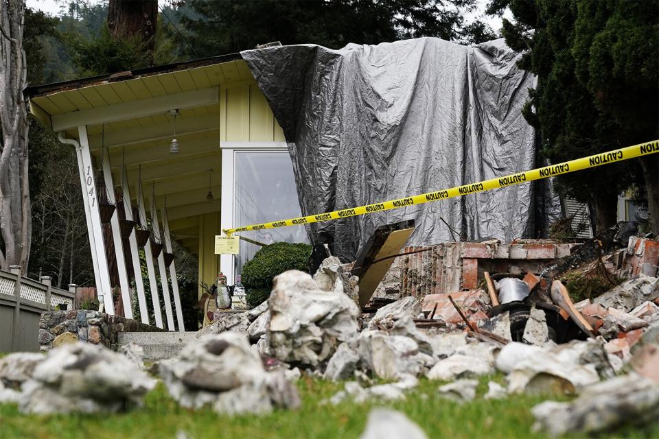 Mandatory Credit: Photo by Godofredo A Vásquez/AP/Shutterstock (13679668h) Home damaged by an earthquake can be seen in Rio Dell, Calif., . A strong earthquake shook a rural stretch of Northern California early Tuesday, jolting residents awake, cutting off power to thousands of people, and damaging some buildings and a roadway, officials said California Earthquake, Fortuna, United States - 20 Dec 2022