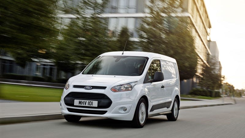 A photo of a white Ford Transit Connect van. 