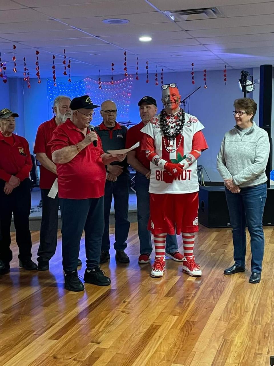 Clyde VFW Post 3343 Trustee Mo Marks presents $10,000 to Jon Paul Peters, known as Big Nut, for the Big Nut Scholarship Fund.