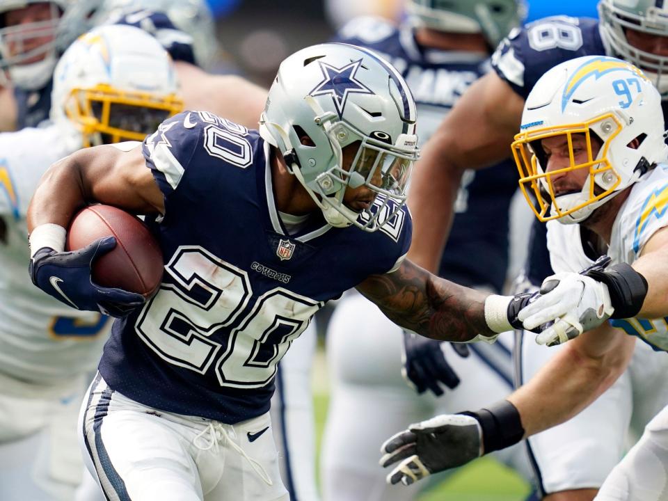 Tony Pollard makes a play against the Los Angeles Chargers.