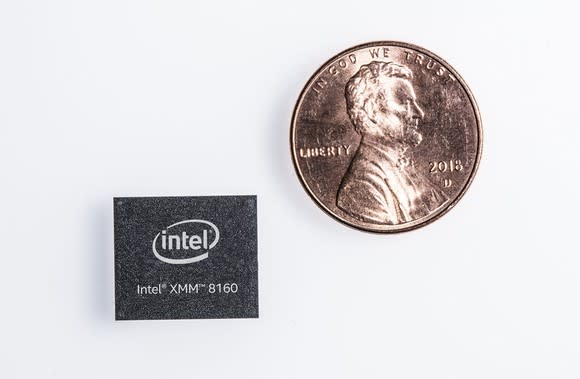 Intel's XMM 8160 5G modem next to a penny.