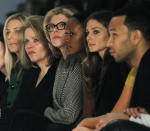 Actress Christine Baranski (3rd L) and singer John Legend (R) watch the Vera Wang Autumn/Winter 2013 collection during New York Fashion Week, February 12, 2013. REUTERS/Brendan McDermid (UNITED STATES - Tags: FASHION ENTERTAINMENT) - RTR3DP9O