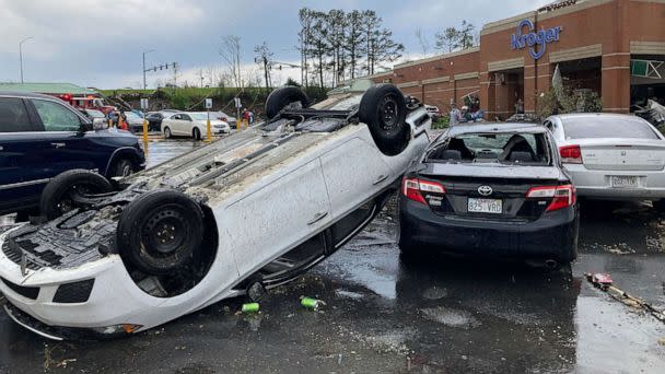 PHOTO: A car is upturned in a Kroger parking lot after a tornado swept through Little Rock, Ark., March 31, 2023. (Andrew Demillo/AP)