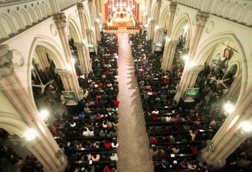 Thousands of Catholics gather for mass at a church in Shanghai. A newly ordained Chinese bishop has not been seen since he quit the state-sanctioned Catholic association on the weekend, amid new tensions between Beijing and the Vatican, reports said on Tuesday