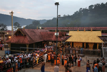 Hindu devotees wait in queues inside the premises of the Sabarimala temple in Pathanamthitta district in Kerala, India, October 18, 2018. REUTERS/Sivaram V
