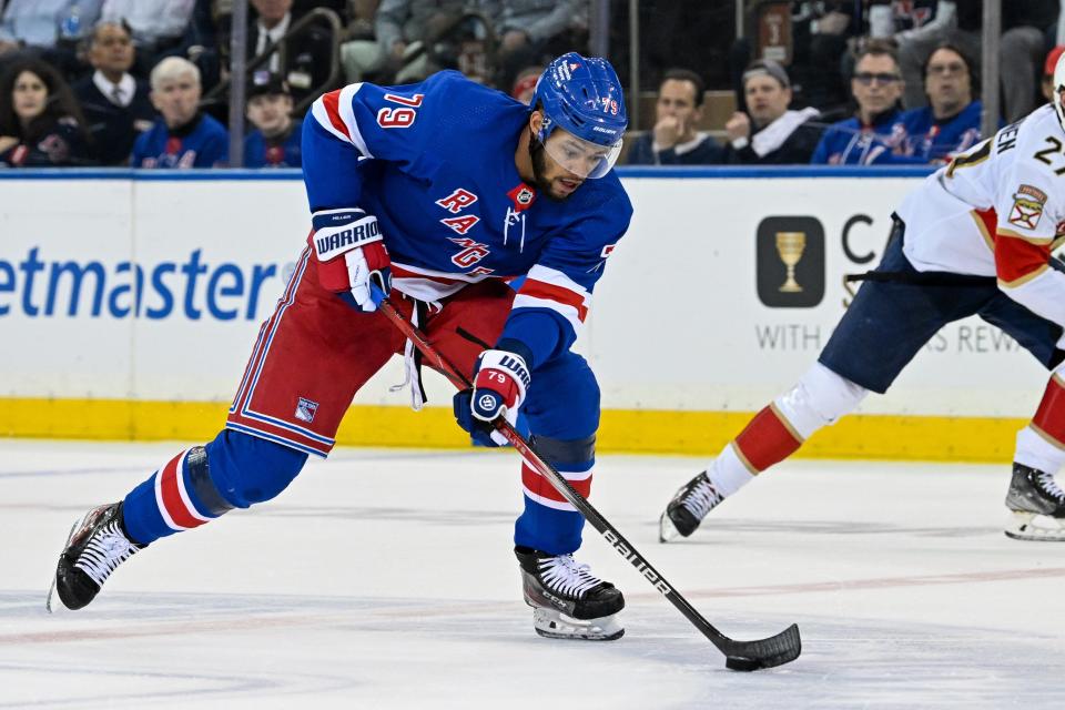 May 30, 2024; New York, New York, USA; New York Rangers defenseman K'Andre Miller (79) skates across center ice against the Florida Panthers during the first period in game five of the Eastern Conference Final of the 2024 Stanley Cup Playoffs at Madison Square Garden.