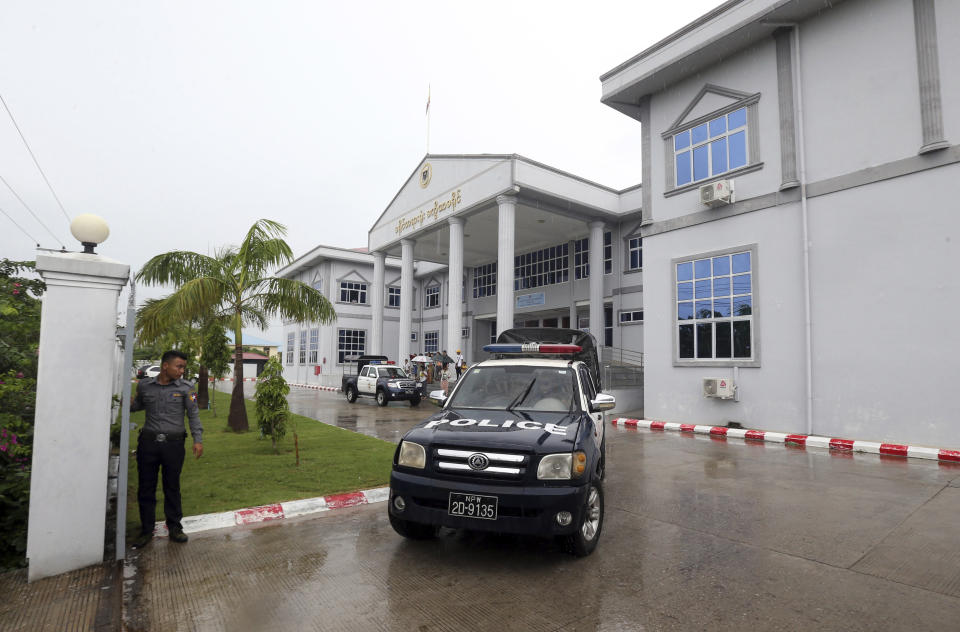 A police truck carrying rape suspect Aung Kyaw Myo, leaves the court after court appearance Wednesday, July 24, 2019, in Naypyitaw, Myanmar. A Myanmar court held another hearing related to the rape of a 2-year old girl at her nursery school, in a case that generated huge interest and protests. (AP Photo/Aung Shine Oo)