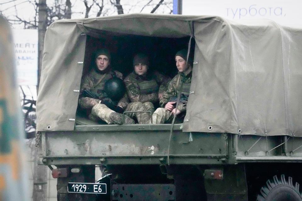 Ukrainian soldiers in Mariupol on Feb. 24, 2022.