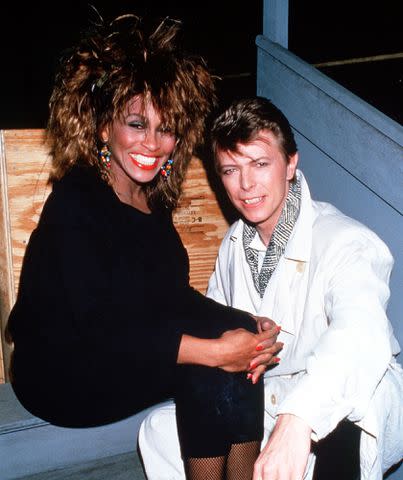 <p>Dave Hogan/Getty Images</p> Tina Turner and David Bowie in 1989