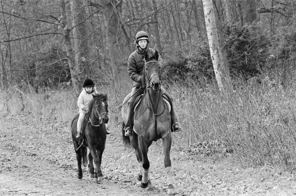 <p>Princess Anne's daughter, Zara Phillips, enjoys a riding lesson on the family's estate in Sandringham after the New Year holiday in 1987. The royal family travels to Sandringham every December and celebrates the Christmas holiday at St. Mary Magdalene Church. </p>