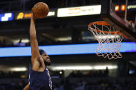 Minnesota Timberwolves center Karl-Anthony Towns dunks against the Phoenix Suns during the first half of a preseason NBA basketball game Tuesday, Oct. 8, 2019, in Phoenix. (AP Photo/Rick Scuteri)