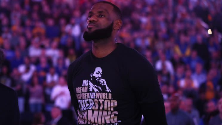 LeBron James wears a shirt honoring Dr. Martin Luther King Jr. during a game against the Warriors earlier this season. (Getty Images)