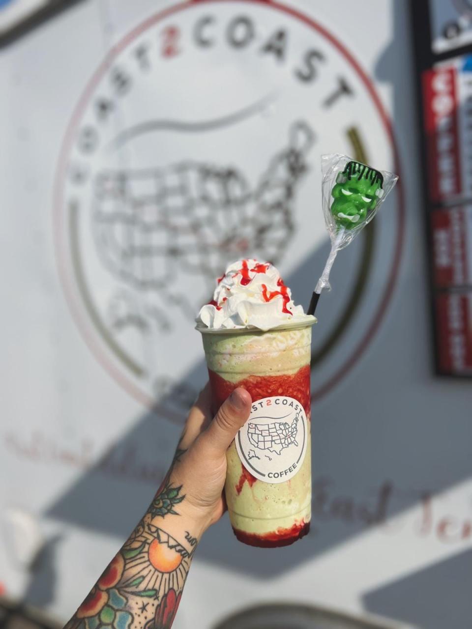 The mobile coffee trailer offers seasonal drinks such as the Frankenstein Frappe, which includes vanilla bean flavoring and raspberry puree.