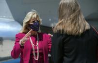 First lady Jill Biden speaks with Commissioner Charlene Pyskoty as she arrives at Albuquerque International Sunport in Albuquerque, N.M., Tuesday, April 21, 2021. (Mandel Ngan/Pool via AP)