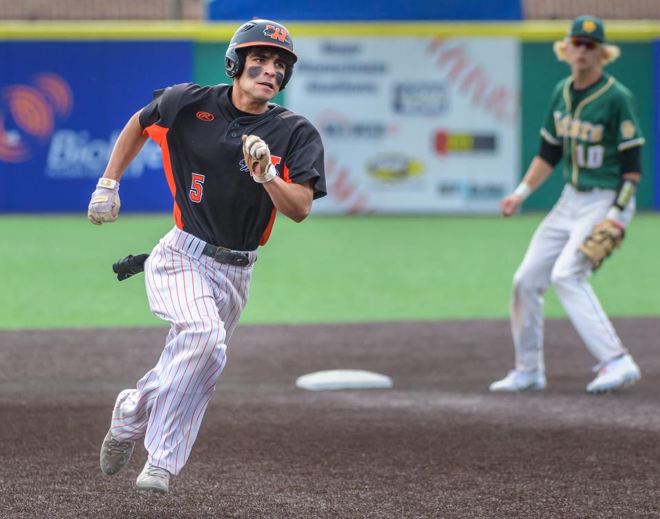 Washington's Jack Limas speeds around second base on a long hit into deep left field against Crystal Lake South in the third inning of the Class 3A state baseball third-place game Saturday, June 11, 2022 at Duly Health & Care Field in Joliet. Limas scored on an inside-the-park home run.