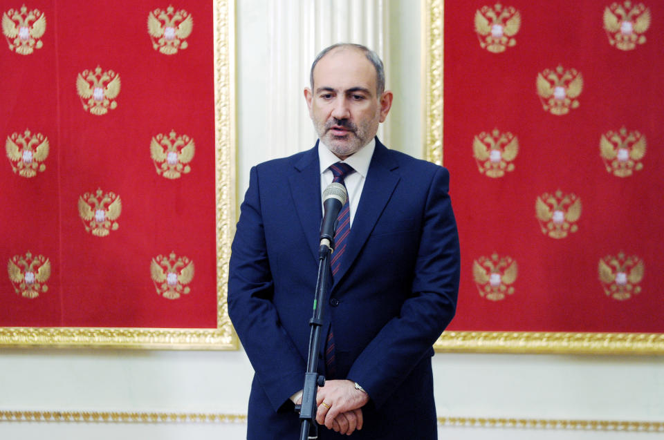 Armenian Prime Minister Nikol Pashinyan speaks to media after his talks with Russian President Vladimir Putin and Azerbaijan's President Ilham Aliyev in Kremlin in Moscow, Russia, Monday, Jan. 11, 2021. Russian President Vladimir Putin on Monday hosted his counterparts from Armenia and Azerbaijan, their first meeting since a Russia-brokered truce ended six weeks of fighting over Nagorno-Karabakh. (Mikhail Klimentyev, Sputnik, Kremlin Pool Photo via AP)