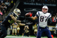 <p>New Orleans Saints safety Kenny Vaccaro (32) intercepts a pass ahead of New England Patriots tight end Rob Gronkowski (87) but the play is negated by a defensive holding on safety Vonn Bell (not pictured) during the second half of a game at the Mercedes-Benz Superdome. The Patriots defeated the Saints 36-20. Mandatory Credit: Derick E. Hingle-USA TODAY Sports </p>