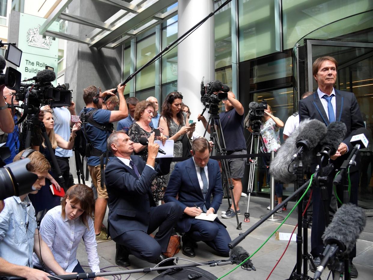 Sir Cliff looked visibly shaken outside the court following the ruling: Reuters