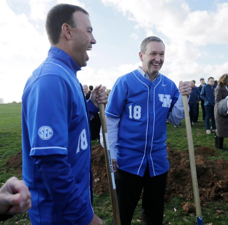 Kentucky baseball coach Nick Mingione and UK athletics director Mitch Barnhart shared a laugh during the groundbreaking ceremony for the new facility that became Kentucky Proud Park on March 2, 2017.