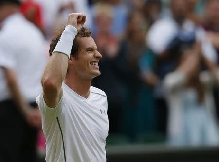 Andy Murray of Britain celebrates after winning his match against Andreas Seppi of Italy at the Wimbledon Tennis Championships in London, July 4, 2015. REUTERS/Suzanne Plunkett