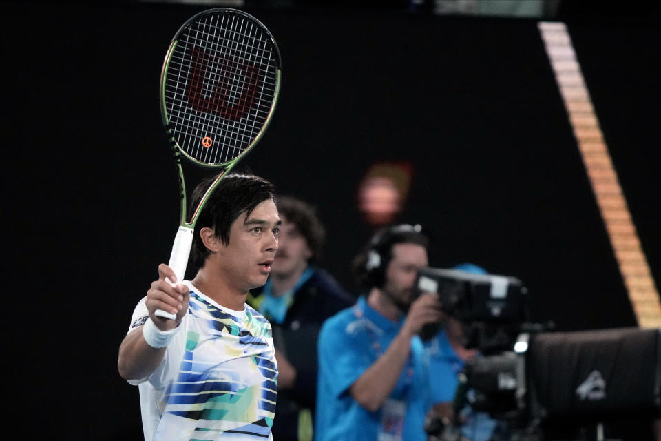 Mackenzie McDonald of the U.S., reacts after defeating Rafael Nadal of Spain in their second round match at the Australian Open tennis championship in Melbourne, Australia, Wednesday, Jan. 18, 2023. (AP Photo/Dita Alangkara)